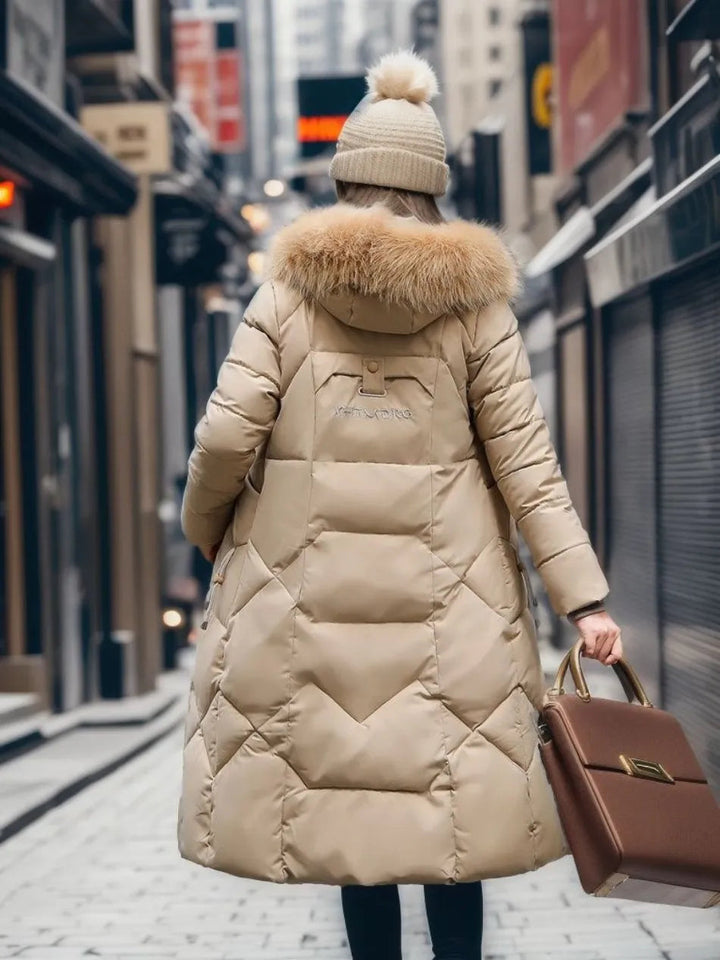 Nyxelle | Luxury puffer jacket with fur hood