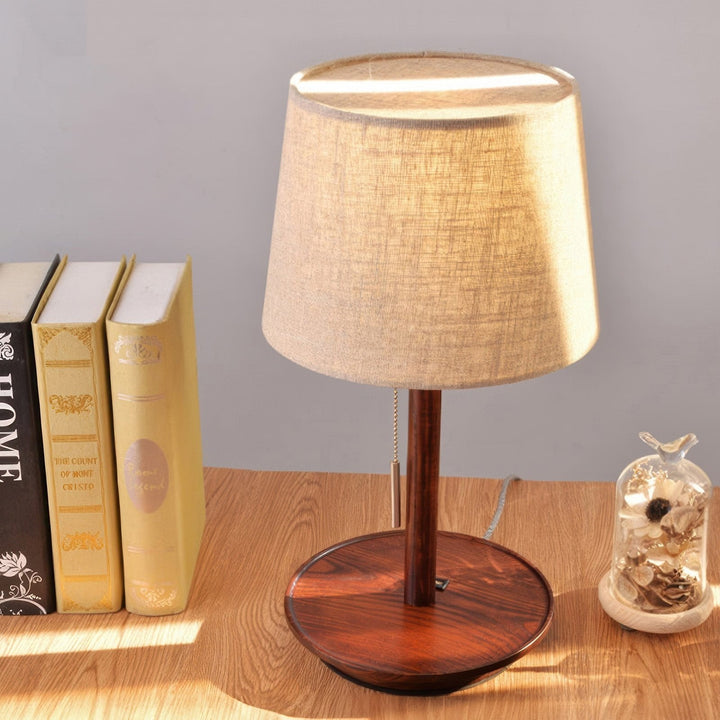 Gentle Glow lamp made of Nordic walnut wood with luxurious fabric accents