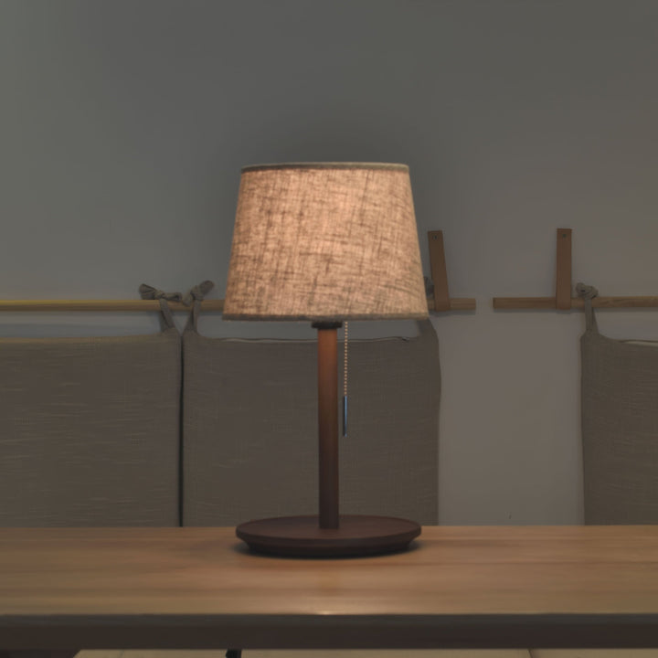 Gentle Glow lamp made of Nordic walnut wood with luxurious fabric accents