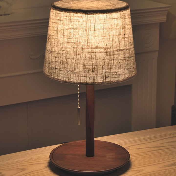 Gentle Glow lamp made of Nordic walnut wood with luxurious fabric accents
