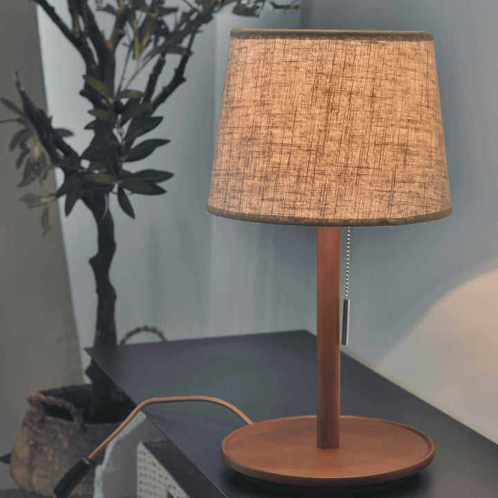 Gentle Glow lamp made of Nordic walnut wood with luxurious fabric accents
