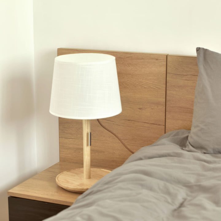 Gentle Glow lamp made of Nordic walnut wood with luxurious fabric accents
