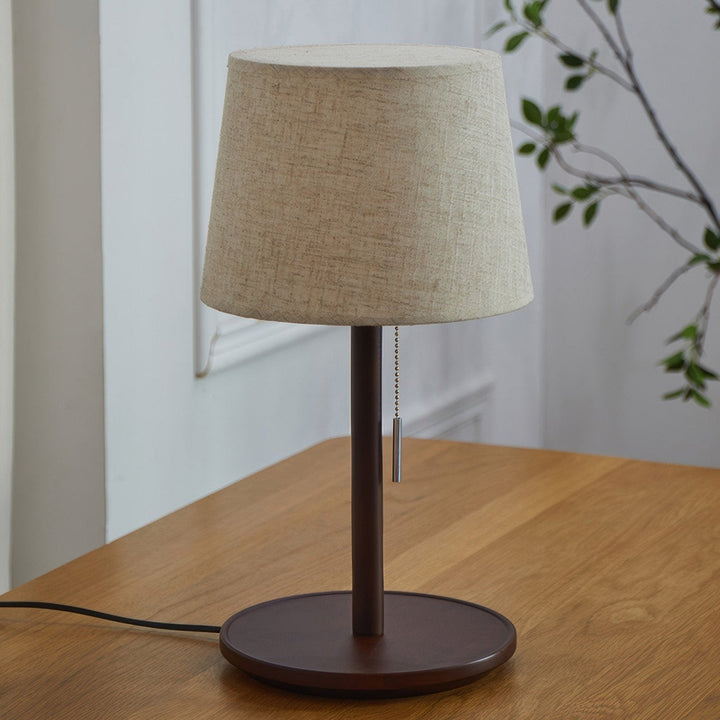 Gentle Glow lamp made of Nordic walnut wood with luxurious fabric accents