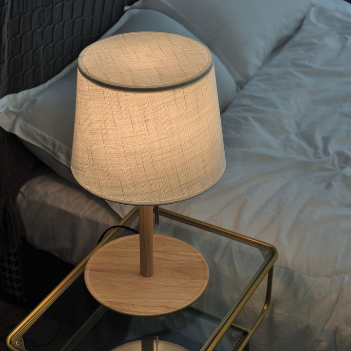 Gentle Glow lamp made of Nordic walnut wood with luxurious fabric accents